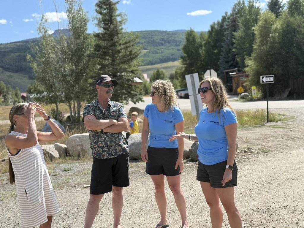 Friends and neighbors gathered with the Gunnison Valley behind