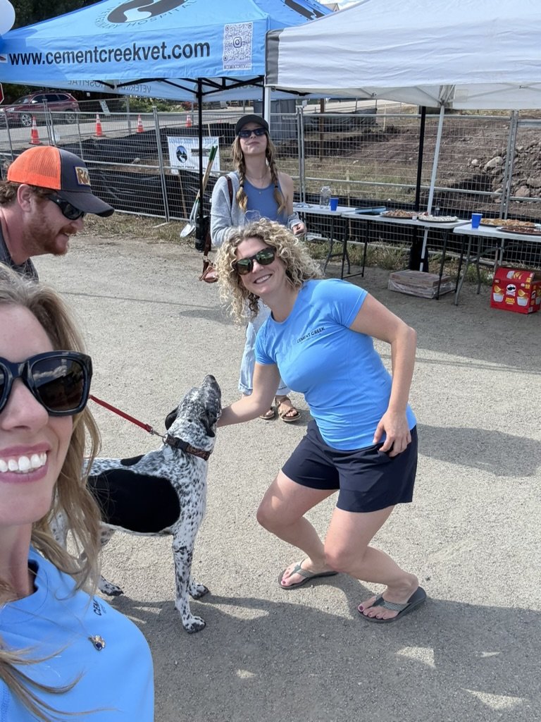 Meeting a spotted pup at the Cement Creek event